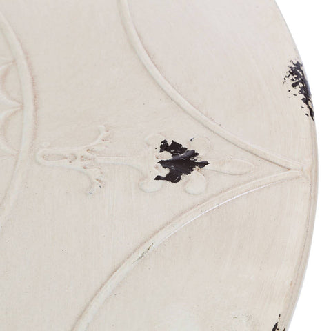 Cream-colored round metal bar table with a textured surface featuring subtle black accents and intricate detailing. The table has a sleek, modern design suitable for various home decor styles