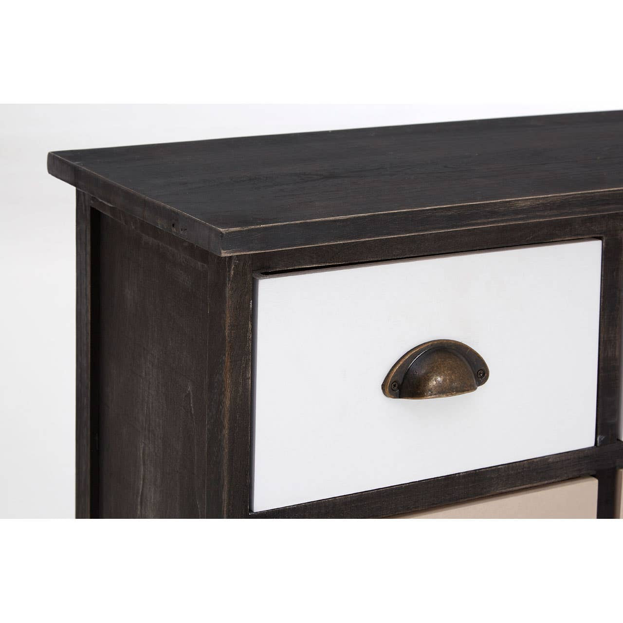 A close-up view of the Urban Loft 6 Drawers Chest, showcasing the dark wood finish and a white drawer front with a bronze handle. The top surface is flat and smooth, suitable for decorative items