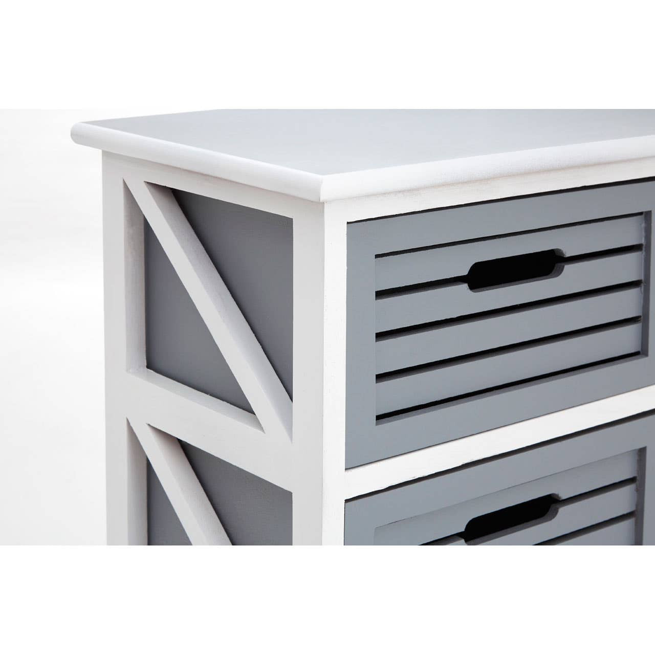 A close-up view of the Vermont 6 Grey Drawers Unit, featuring a white frame with a smooth top surface and six grey slatted drawers, each with a handle. The design includes a cross-pattern detail on the sides, highlighting its modern yet rustic aesthetic