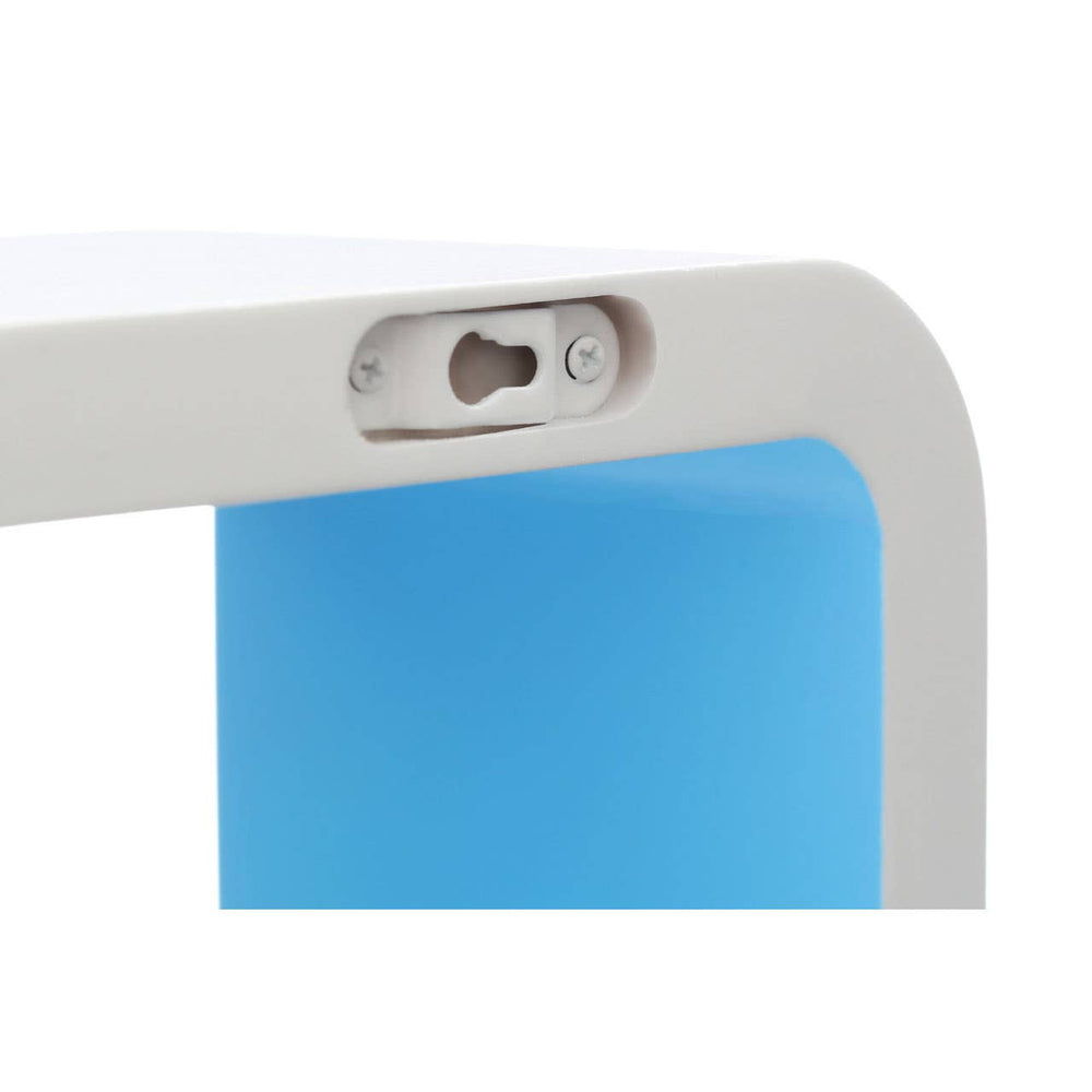Close-up view of a white floating wall cube featuring a rounded edge and a blue interior. The image highlights the mounting hardware on the back, showcasing the design and construction details of the cube
