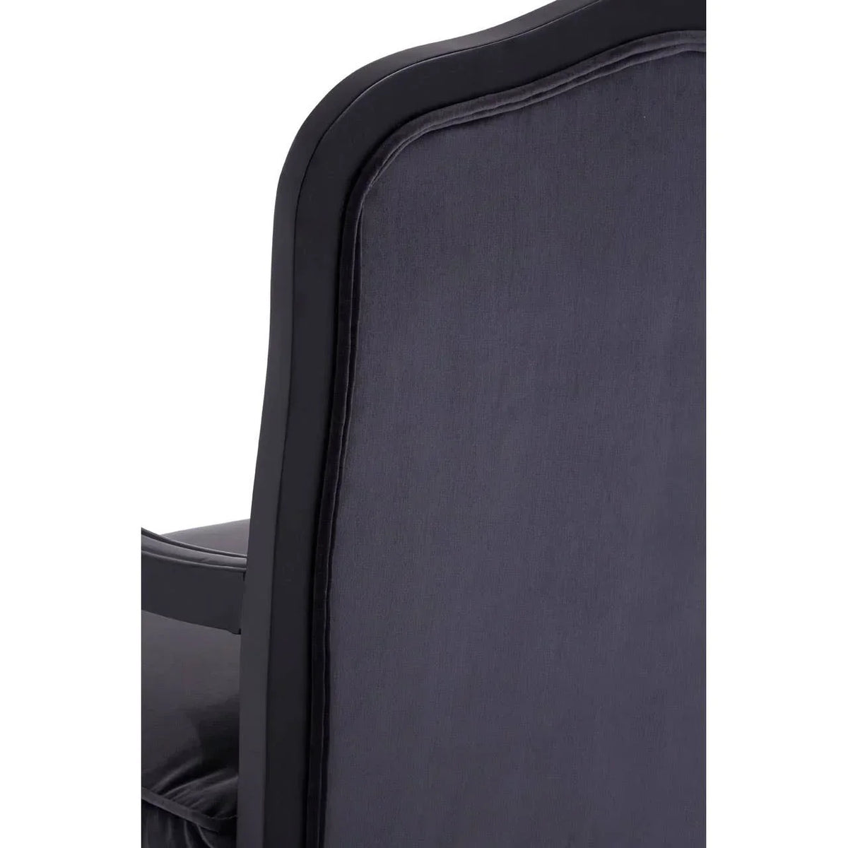 Close-up of dark fabric armchair backrest with black wood frame