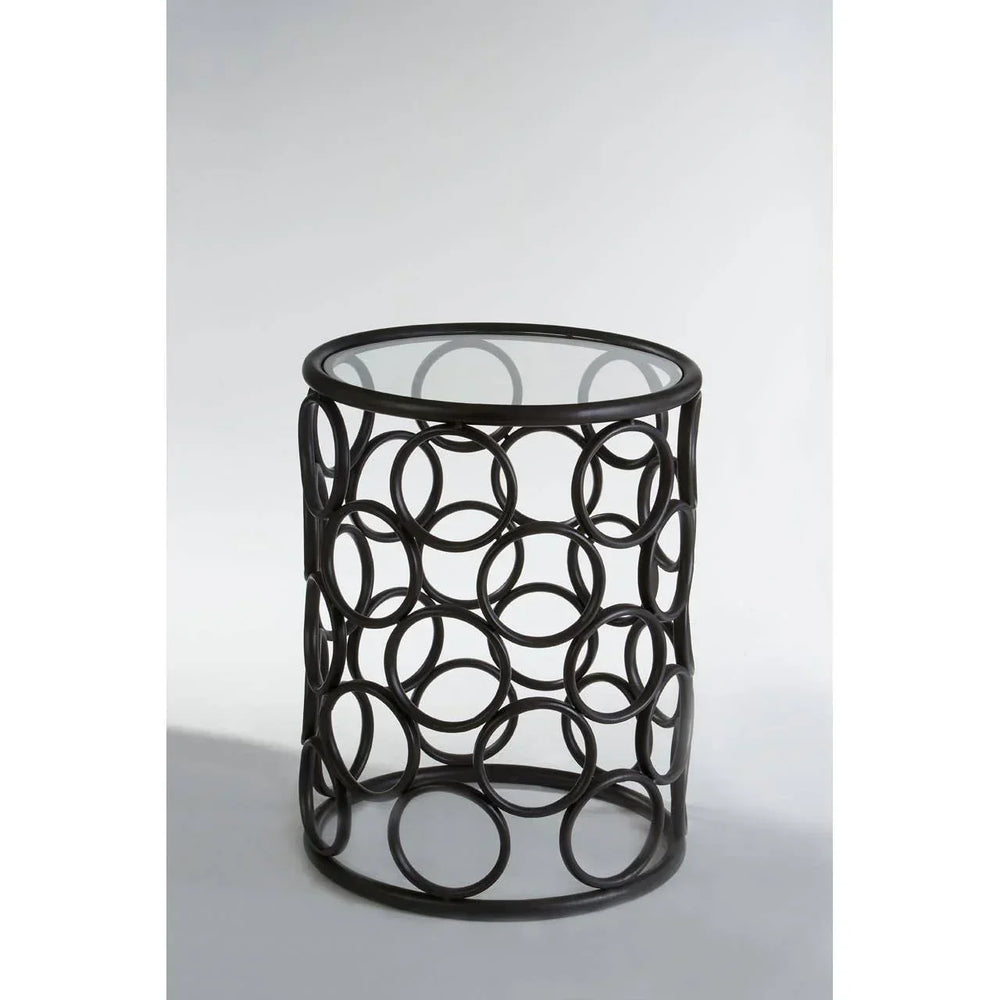 Round metal side table with glass top and open geometric circle base