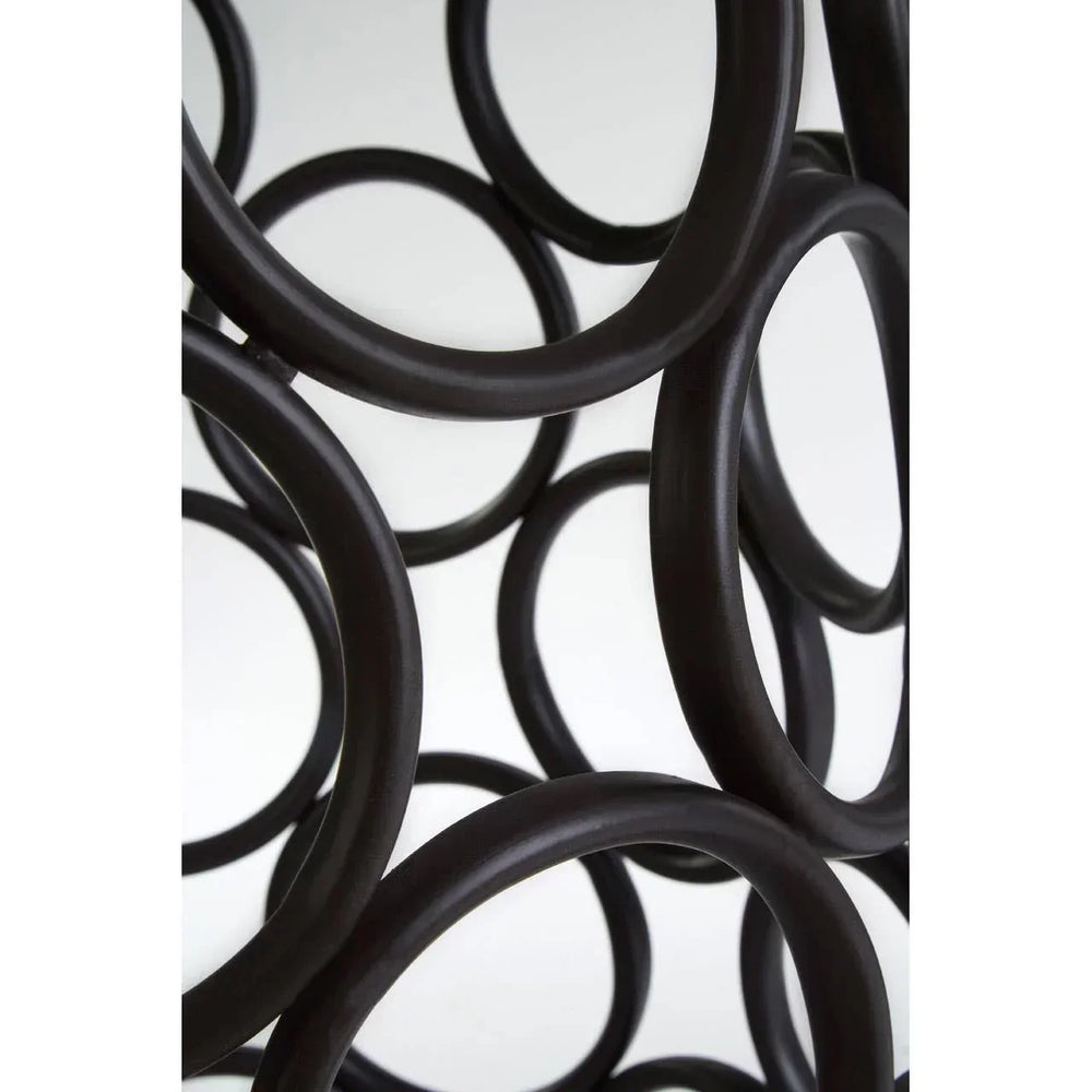 Closeup of black metal circular frame detail for home furniture