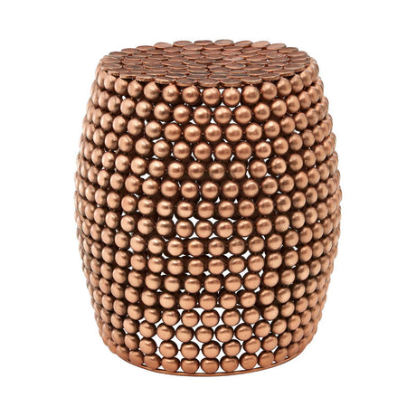 Copper finish barrel stool with a textured surface made up of small, round beads, featuring a cylindrical shape and a smooth top. The stool has a warm, metallic sheen and is designed for both decorative and functional use in home settings