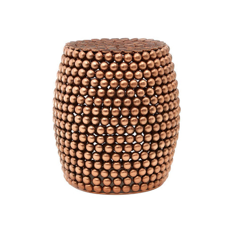 Copper finish barrel stool with a textured surface featuring a pattern of small, raised dots, creating a stylish and modern look. The stool has a rounded shape and a sturdy base, suitable for use as extra seating or a decorative accent in home interiors