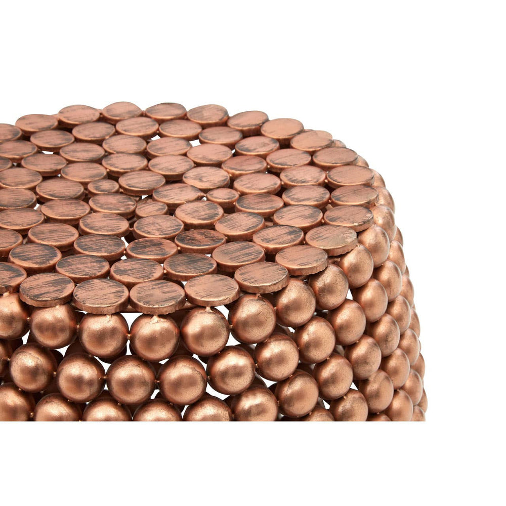 Copper finish barrel stool featuring a textured surface made up of small, rounded shapes, creating a visually striking design. The stool has a cylindrical shape with a smooth top and a wider base, suitable for use as a seat or decorative accent