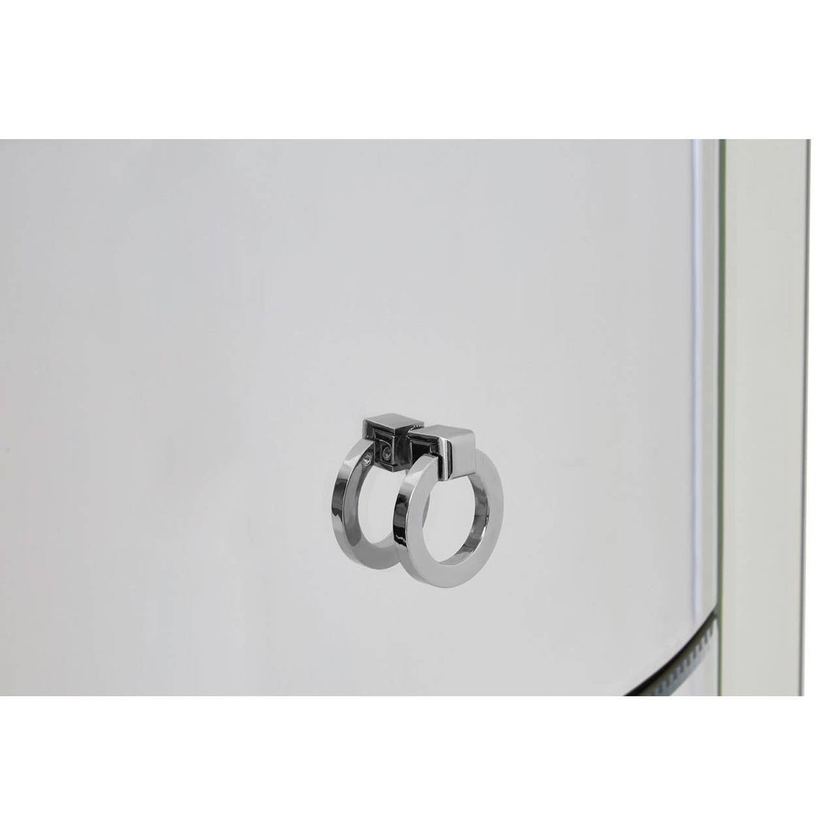Close-up view of a silver drawer pull on a white curved drawer front, showcasing the sleek design of the Verona Curved Tall Boy Drawers
