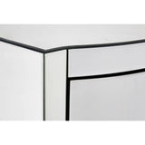 Close-up view of the corner of a tall boy drawer with a sleek, curved design, featuring a glossy white finish and contrasting black edges. The drawer front is smooth and minimalistic, emphasizing modern aesthetics
