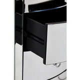 Curved tall boy drawers with a sleek chrome finish and black accents, featuring a partially open drawer to showcase the interior space. The design emphasizes modern aesthetics with smooth lines and a polished surface