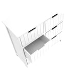 White wooden chest of drawers with vertical panel design, top view, one drawer open
