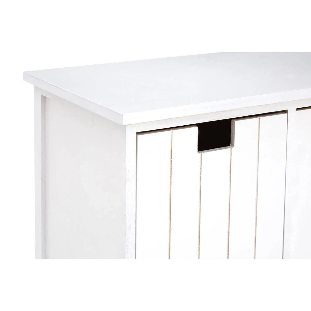 White wooden storage cabinet with vertical panel detail and cutout handle