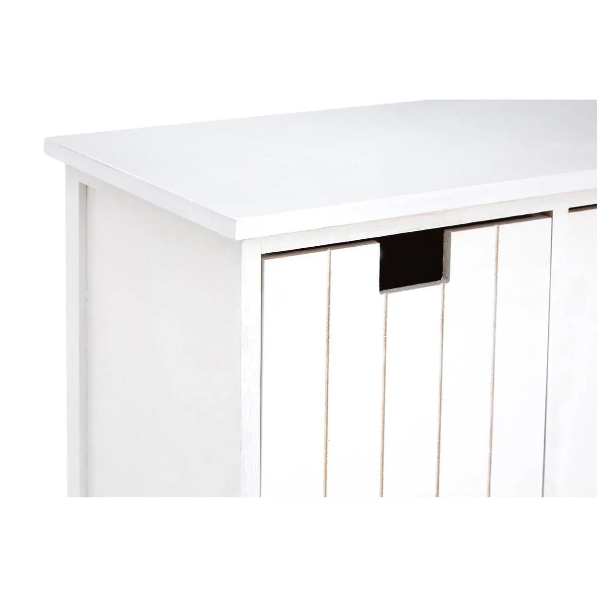 White wooden storage cabinet with vertical panel detail and cutout handle