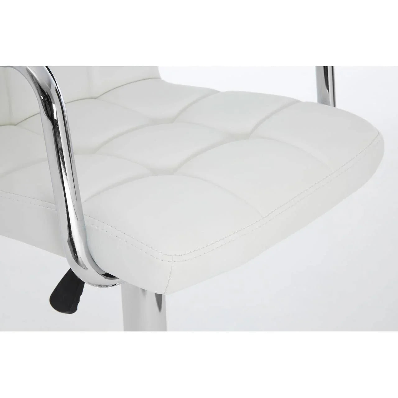 White leather office chair seat with chrome armrest and quilted stitching detail