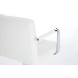 White faux leather dining chair with chrome armrest detail, rear side view