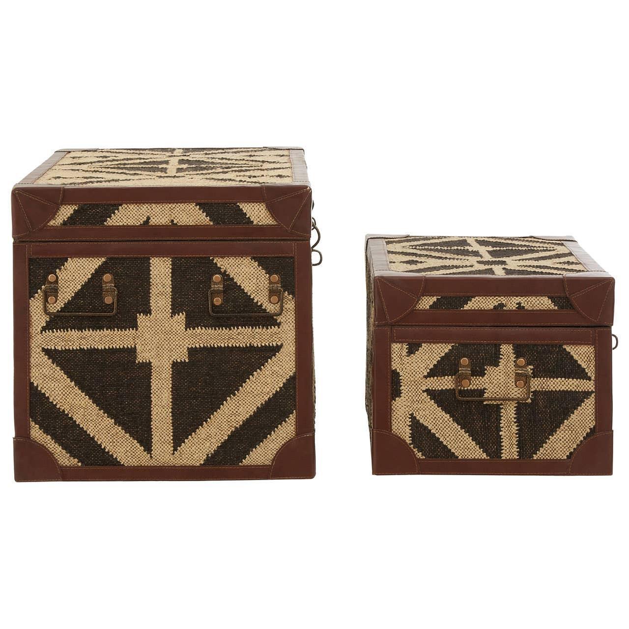 Set of two geometric woven storage trunks with brown faux leather trim and handles
