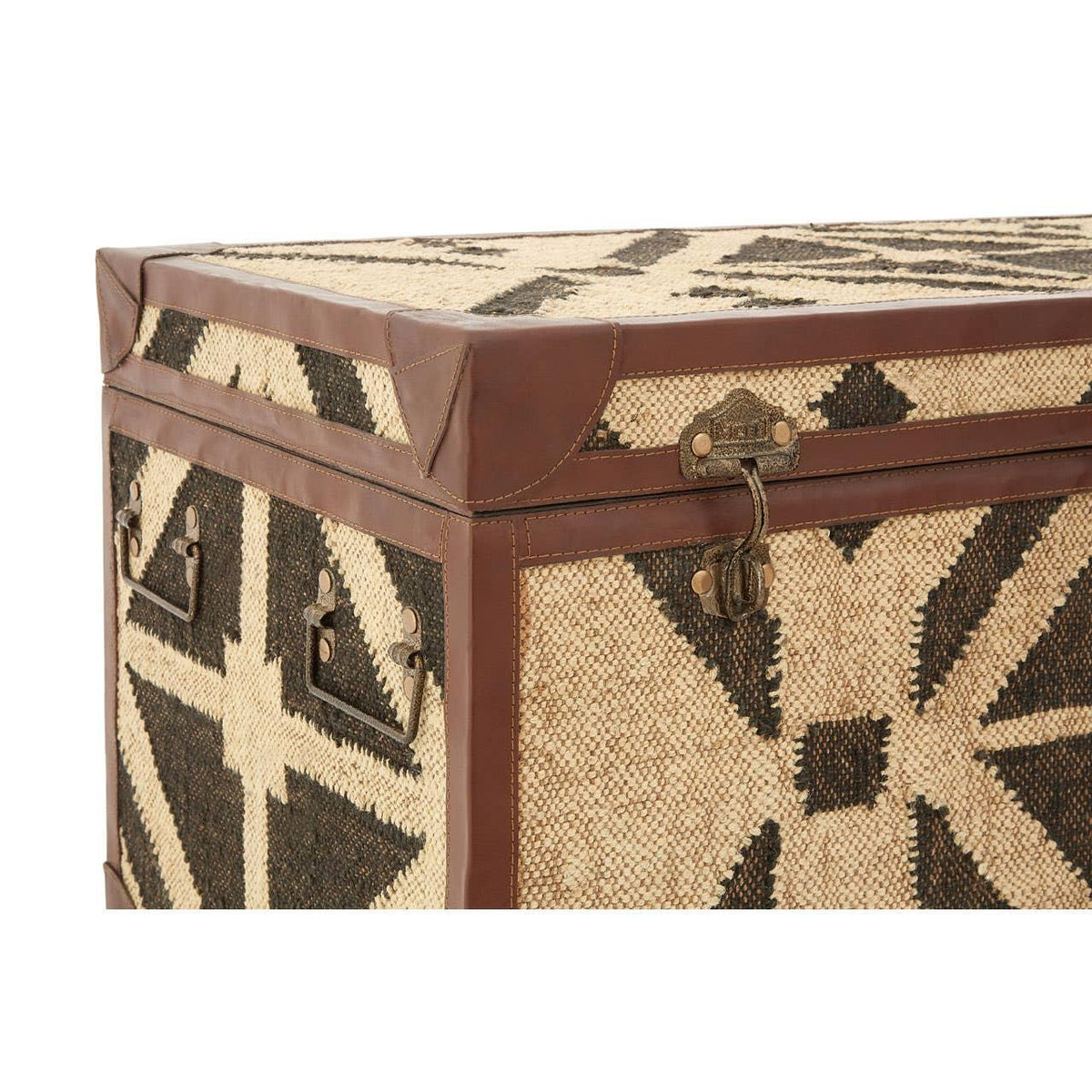 Patterned storage trunk with brown leather trim and metal handles