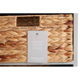 Vermont Two Drawers Four Baskets Cabinet featuring a natural woven texture, two wooden drawers with metal handles, and four wicker baskets arranged below, all set against a light-colored wooden frame. A small tag is attached to one of the drawers
