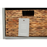 A close-up view of the Vermont One Drawer Two Baskets Cabinet, featuring a wooden drawer with a sleek handle and two woven baskets underneath. A tag hangs from the drawer, providing additional product information. The cabinet has a light wood finish, complementing the natural texture of the baskets