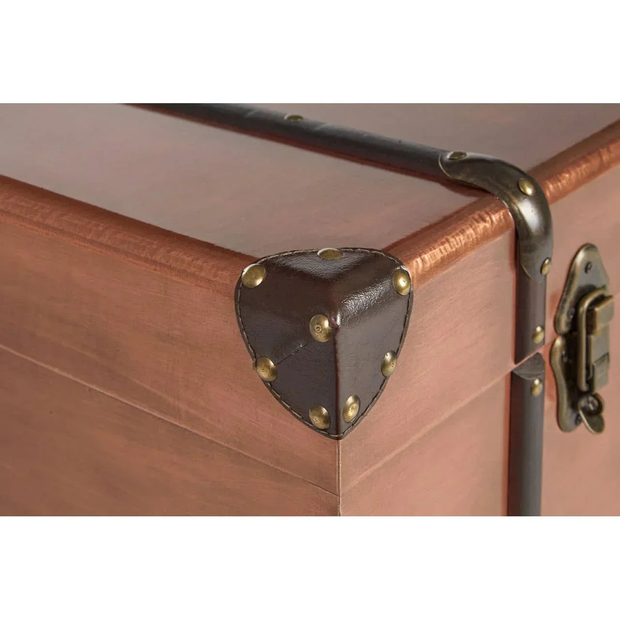 Wood storage chest close-up with metal corner protectors and latch detail