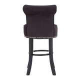 Black velvet bar stool with studded trim and dark wooden legs, rear view