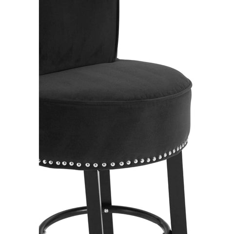 Black velvet bar stool with metal legs and chrome stud detail on seat edge