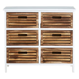 A white furniture unit featuring six wooden drawers with a slatted design, showcasing a natural wood finish. The unit has a clean, modern aesthetic with simple handles and stands on four legs