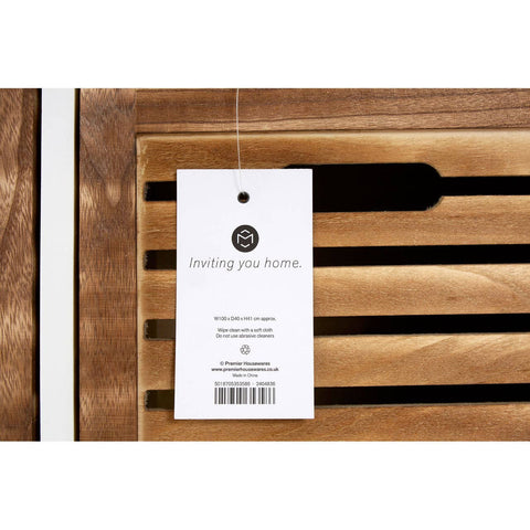 Natural wood drawer chest featuring a sleek design with horizontal slats on the front. A product tag is attached, displaying branding and information. The wood finish showcases a warm, rich tone