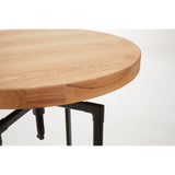 Round bar table featuring a smooth ash veneer top with a natural wood finish and a sturdy black metal base. The edges of the tabletop are slightly rounded, highlighting the wood grain