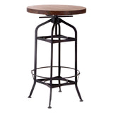 Round walnut tabletop supported by a black metal frame with a circular footrest and two lower shelves, featuring a vintage industrial design. The table has a sturdy base with four legs that taper downwards