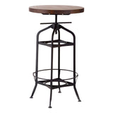 A round walnut wood bar table with a black metal base featuring a circular footrest and an adjustable height mechanism. The design includes a crossbar for stability and four slender legs