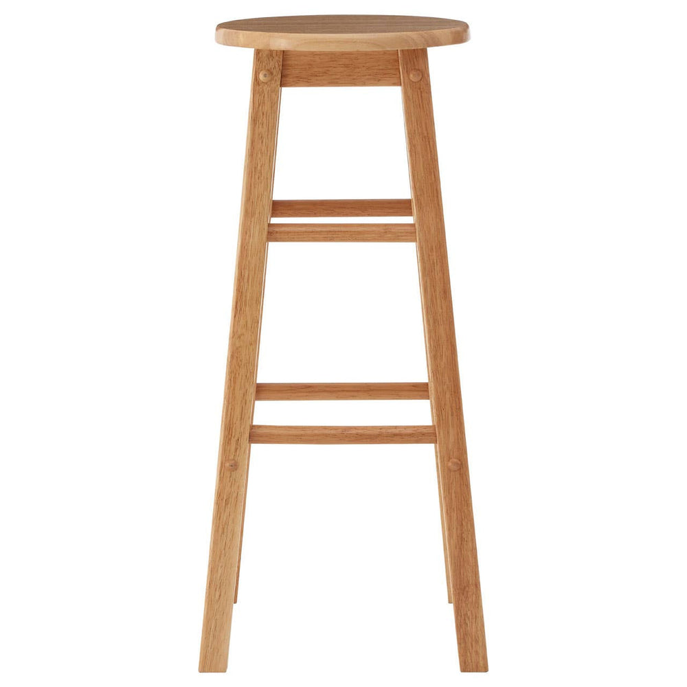 Tall bar stool made from natural tropical Hevea wood, featuring a round seat and four straight legs with a simple, minimalist design. The wood has a light finish that highlights its natural grain