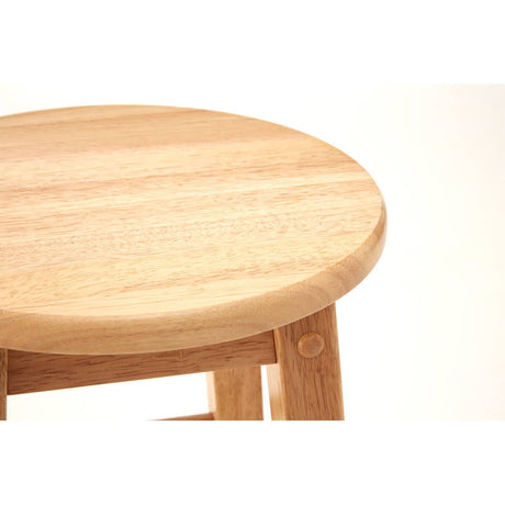 Round, smooth wooden seat of a tall bar stool made from natural tropical Hevea wood, showcasing a light wood finish with subtle grain patterns. The stool features sturdy wooden legs that provide stability