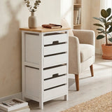 Newport 2 Drawer Chest featuring a white body with a natural wood top, two drawers with sleek black handles, placed beside a light-colored armchair and a potted plant in a bright, airy room