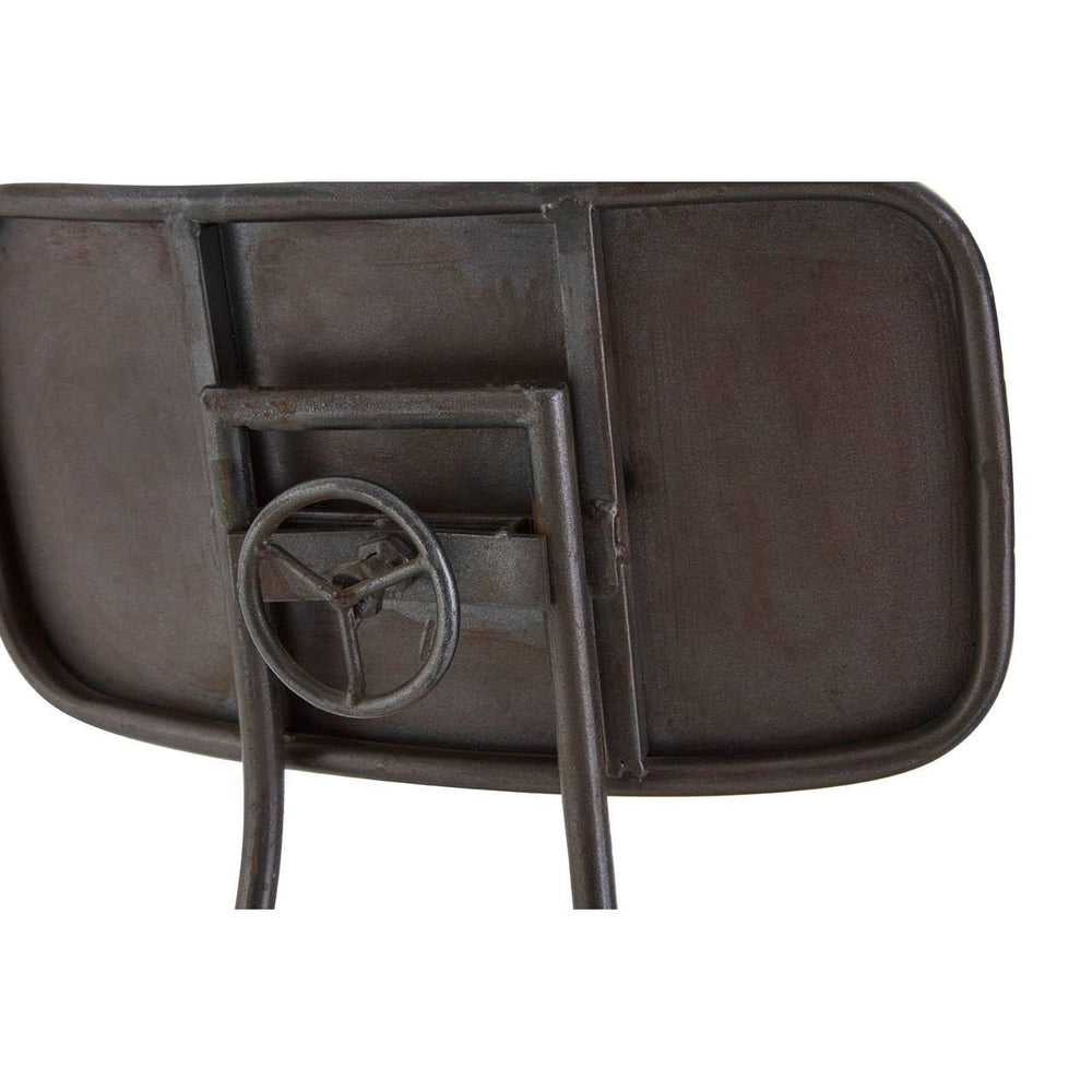 Industrial metal chair backrest with steering wheel detail, rustic finish