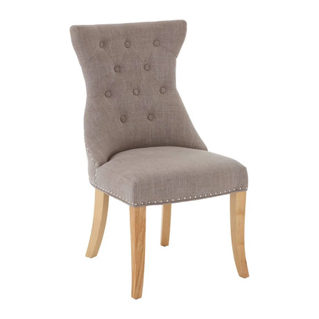 Grey upholstered dining chair with buttoned backrest and light oak wooden legs