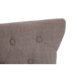 Brown fabric headboard with button-tufted detail and textured upholstery, angled side view