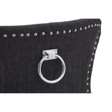 Dark fabric dining chair back with metal ring handle and silver stud detailing