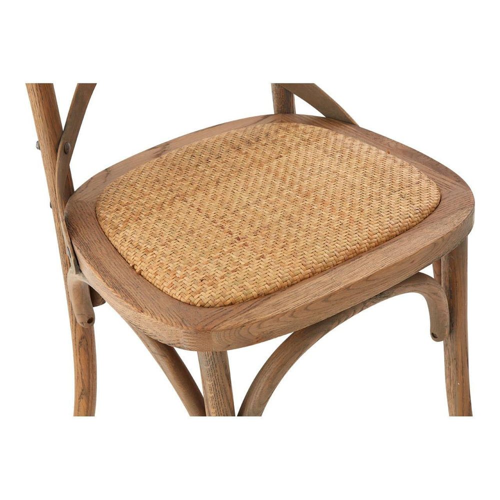 Oak dining chair with curved frame and woven rattan seat closeup