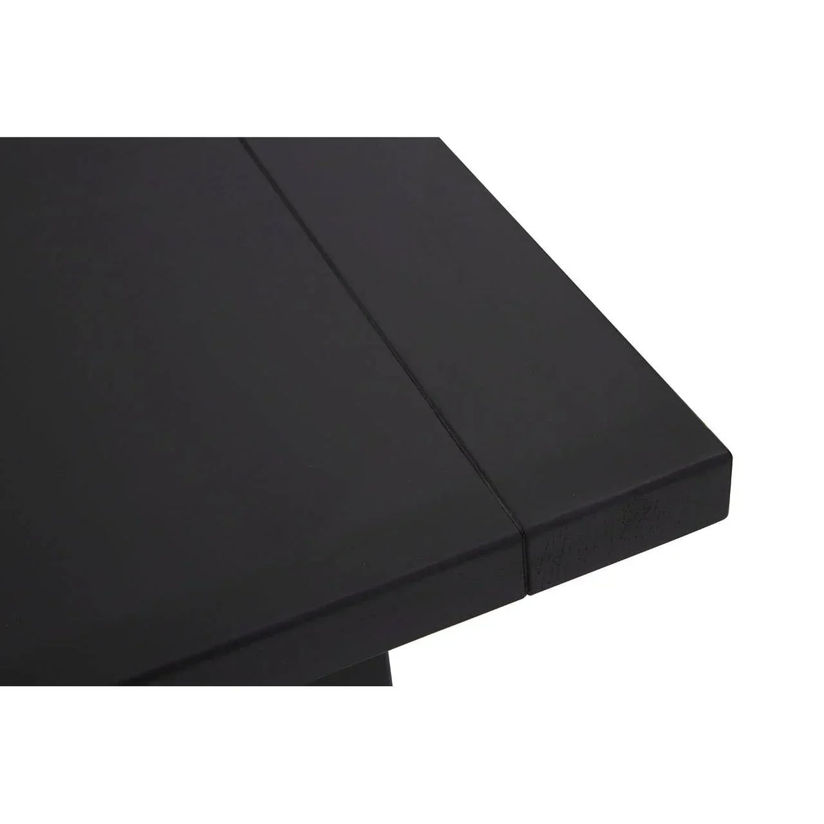 Black dining table corner with smooth wood finish and modern straight edge design