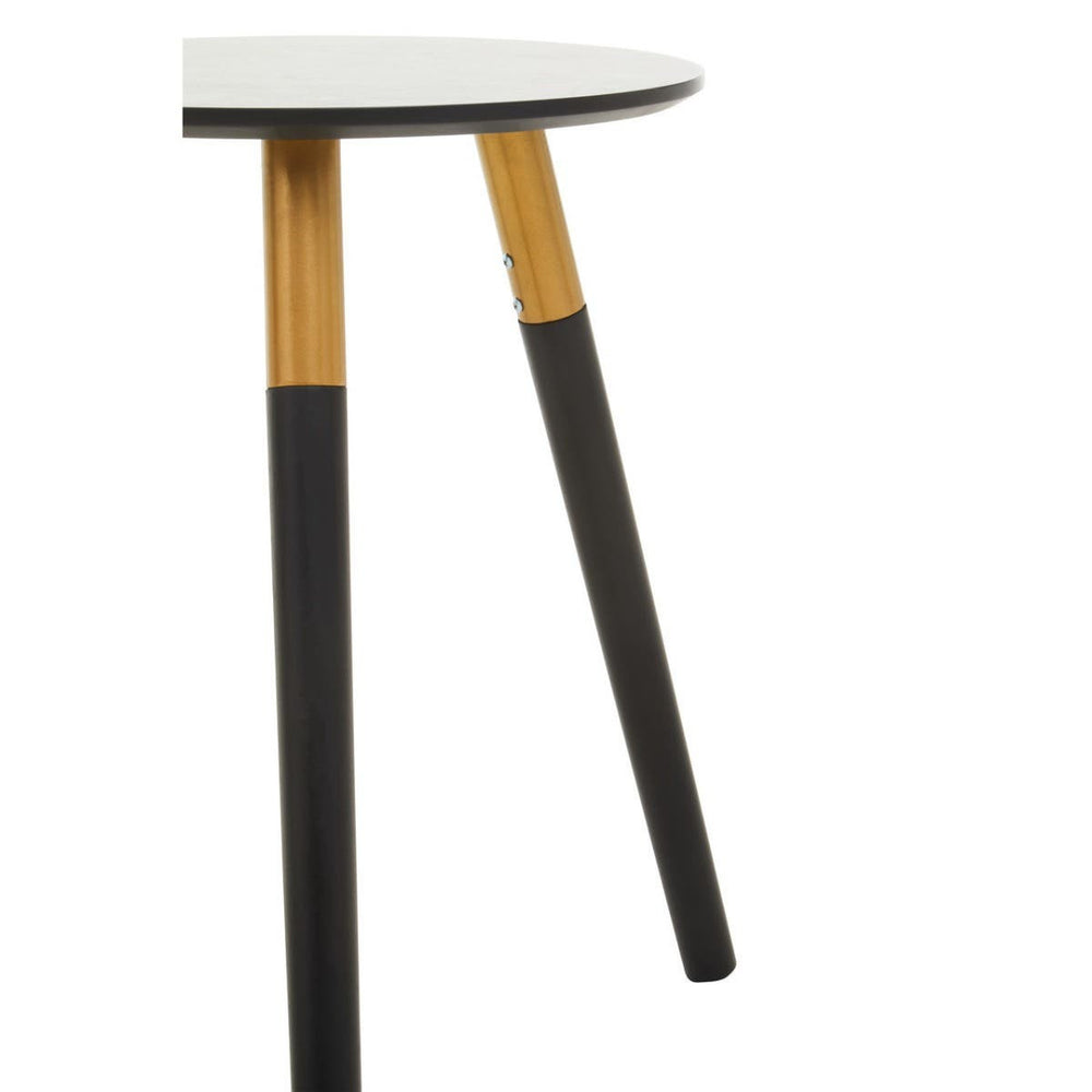 Round side table with a white top and three legs, two of which are black and one is natural wood. The design features a modern aesthetic with a minimalist style