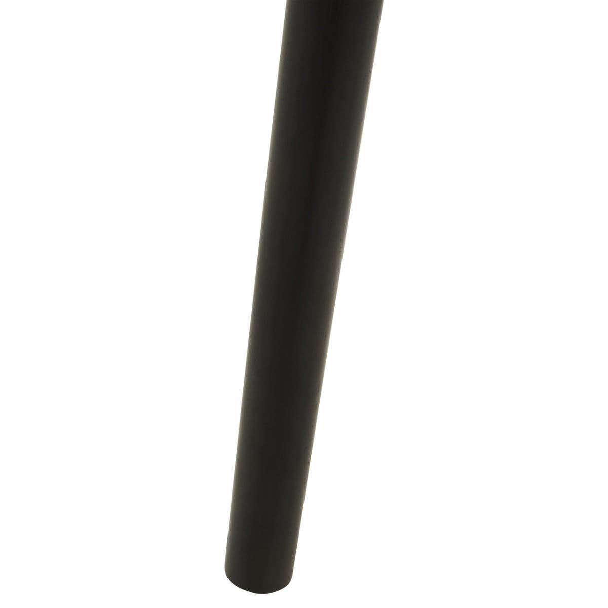 A close-up view of a sleek, dark wooden leg of the Nostra Side Table, showcasing its smooth finish and minimalist design