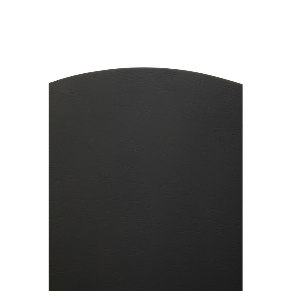 A sleek black side table with a curved top edge, featuring a minimalist design suitable for modern home decor