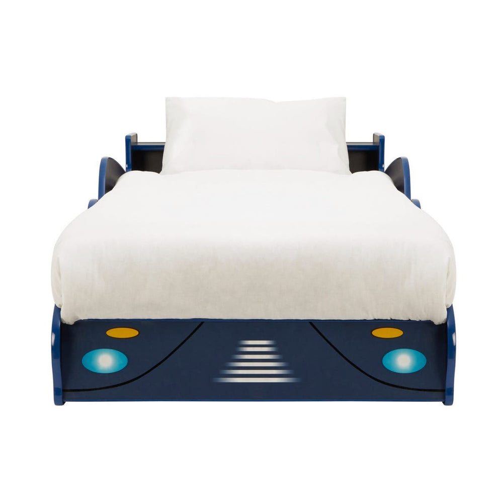 A blue kids racing car bed with a sleek design, featuring headlights and a streamlined front, topped with a white mattress and a simple white bedspread. The bed has side rails for safety and a playful, sporty aesthetic