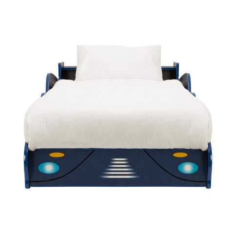 A blue kids racing car bed with a sleek design, featuring headlights and a streamlined front, topped with a white mattress and a simple white bedspread. The bed has side rails for safety and a playful, sporty aesthetic