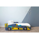 A colorful kids racing car bed designed in blue and yellow, featuring a sleek car shape with the number 8 displayed prominently. The bed is positioned against a light blue wall and is topped with white bedding, creating a playful and inviting bedroom atmosphere