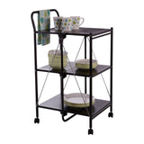 Black rectangular folding kitchen trolley with three shelves, featuring a towel rack on the side. The trolley is equipped with various kitchen items, including cups, plates, and containers, arranged neatly on the shelves. The design includes wheels for easy mobility
