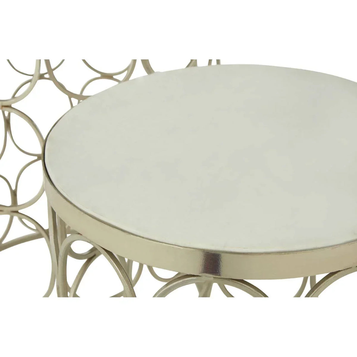 Round metal side table with polished top and decorative looped metal base