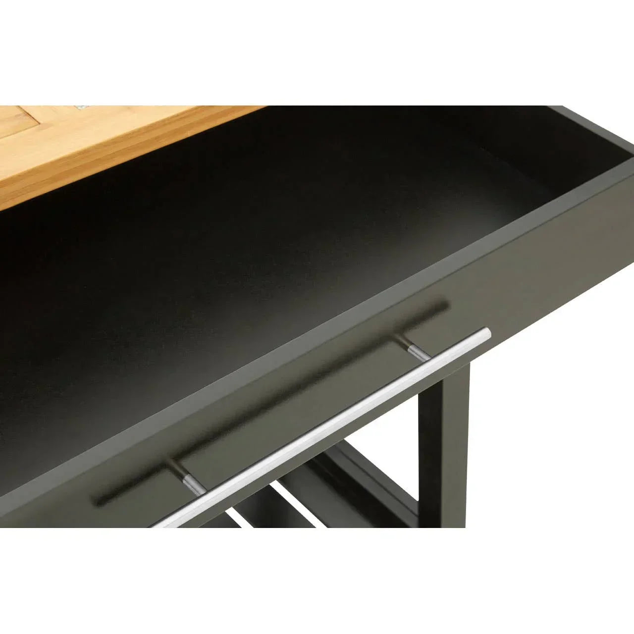 Black drawer detail with chrome handle on wooden console table