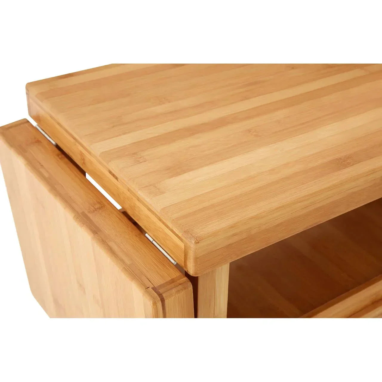 Closeup of wooden chest of drawers showing handleless design and natural wood grain finish
