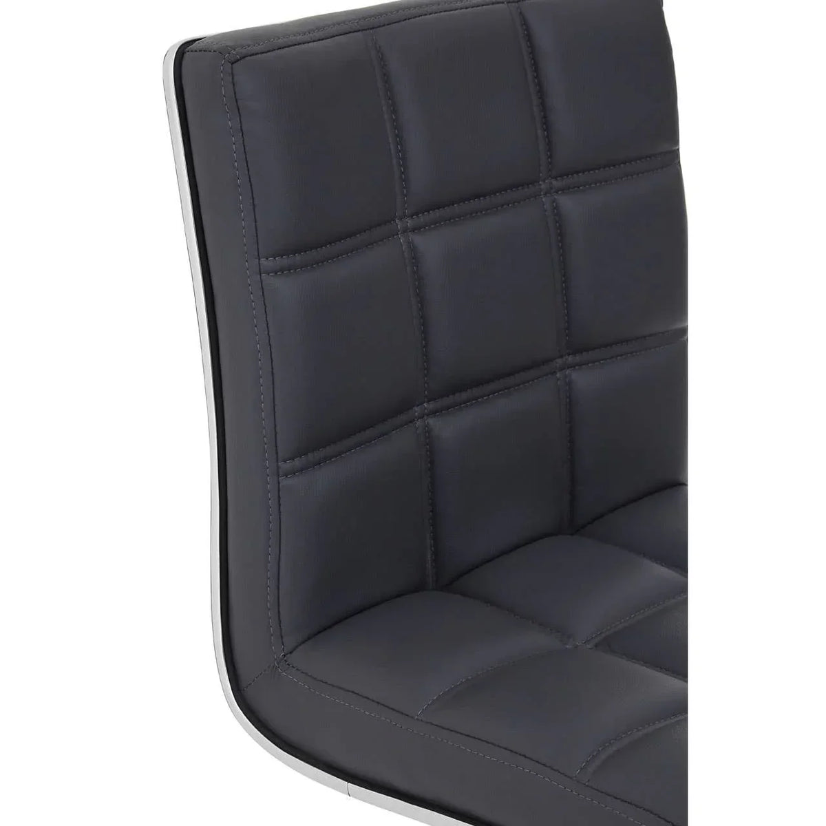 Black faux leather dining chair with quilted stitching and chrome edge, side angle view